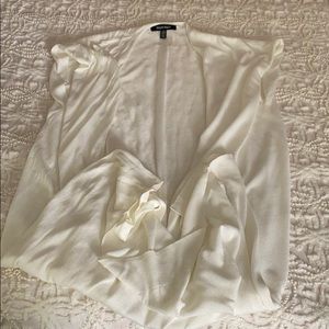 Full length sleeveless sweater